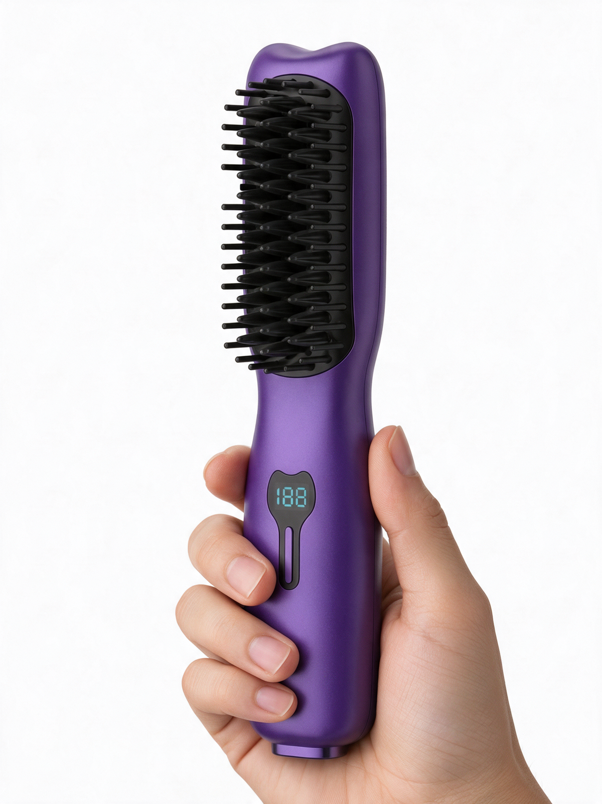 Brosse lissante SORÉA Glide tenue en main, écran de température allumé